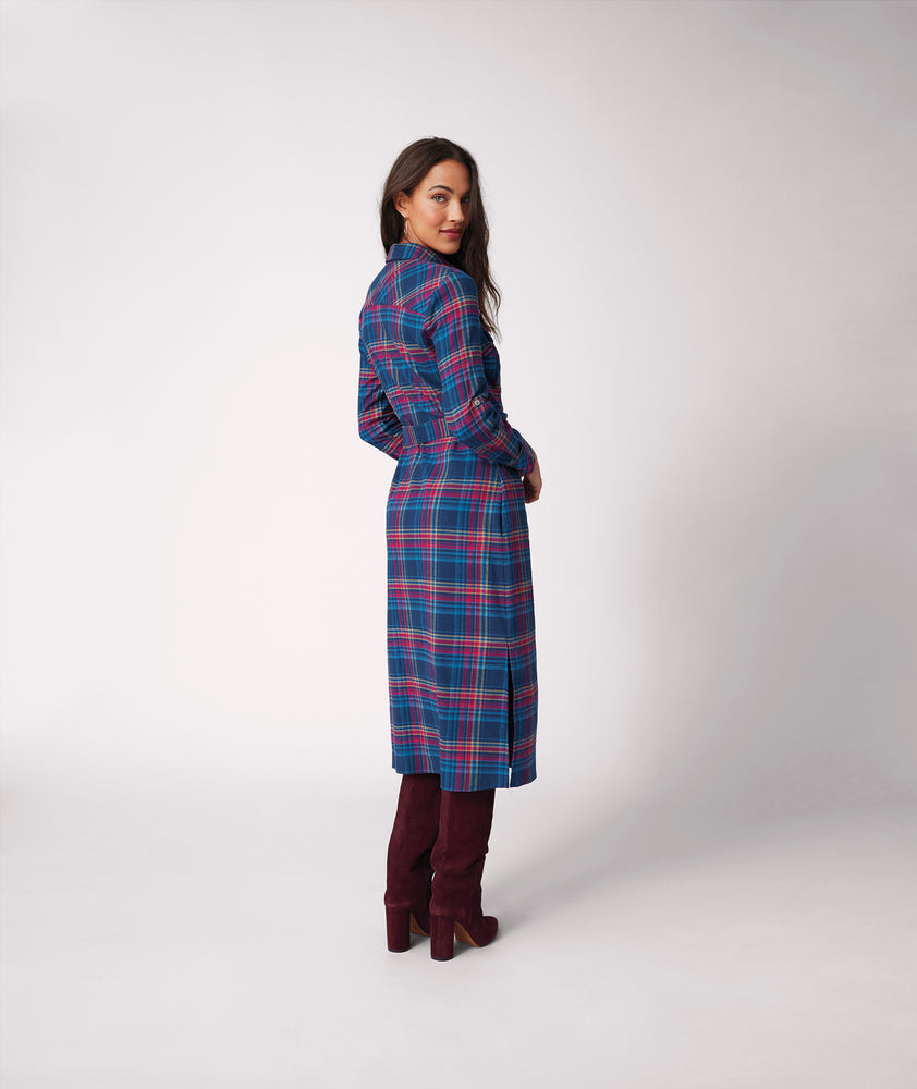 Model is wearing UNTUCKit Joni plaid navy dress.