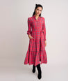 Model is wearing UNTUCKIt Meredith dress in plaid red.