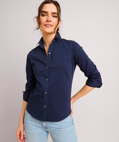 Model is wearing UNTUCKit Bella shirt in navy.