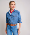 Model is wearing UNTUCKit Cotton Classic Serena Denim Shirt.