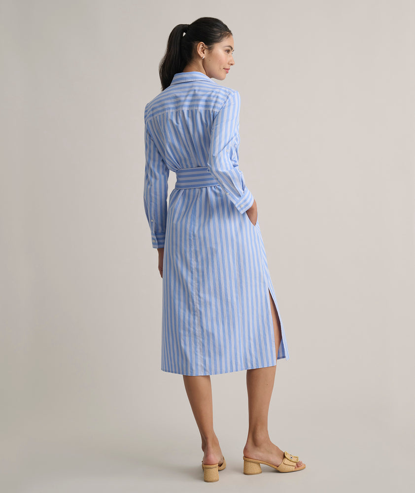 Model us wearing UNTUCKit Adel dress in blue stripped. 