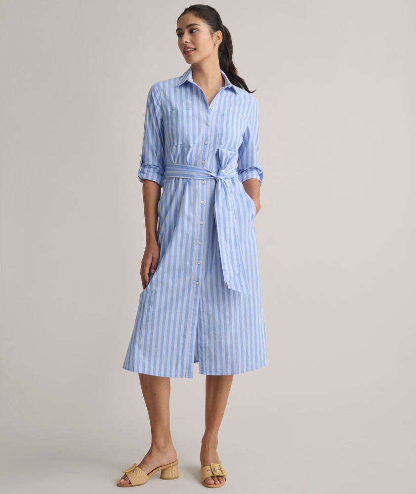 Model us wearing UNTUCKit Adel dress in blue stripped. 