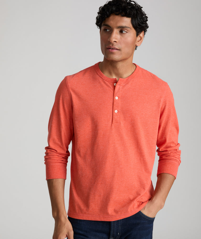 Model is wearing UNTUCKit ultra soft henley Albarino in Summer Fig