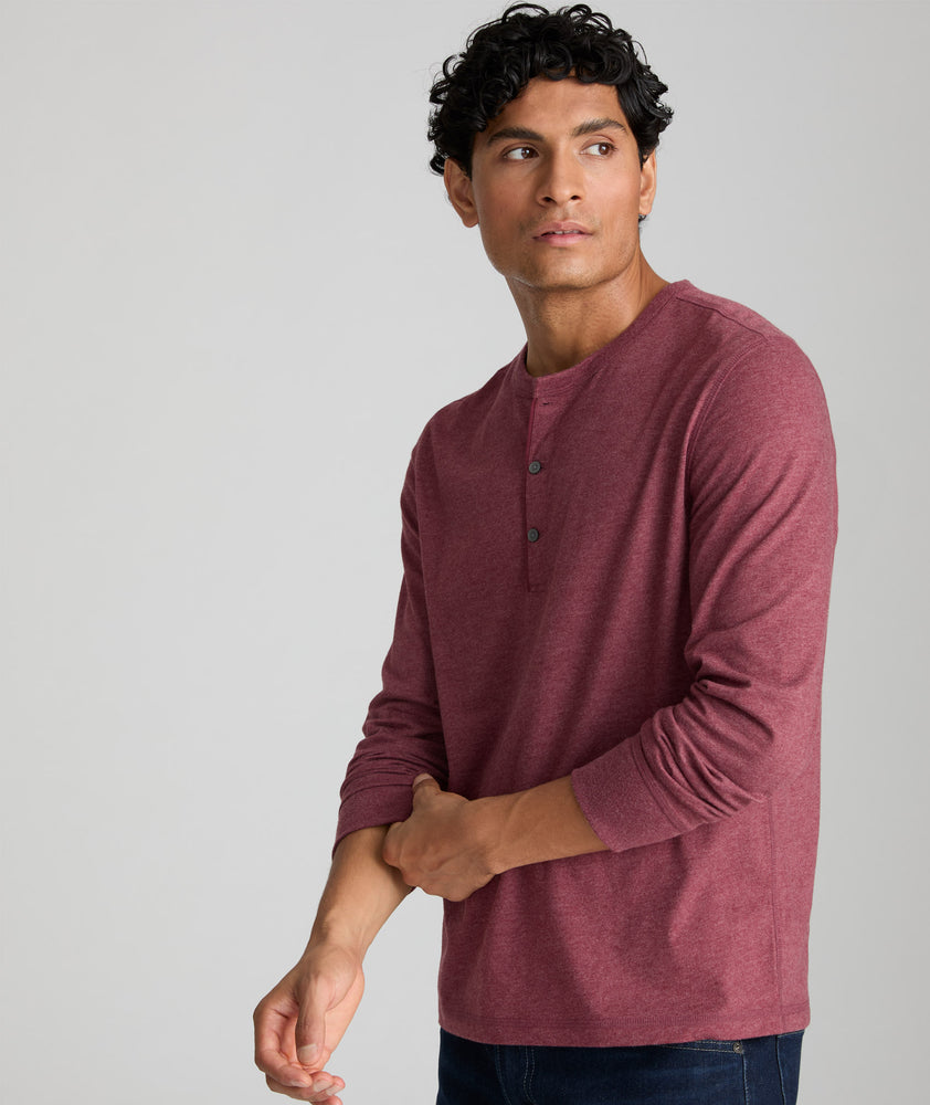 Model is wearing UNTUCKit Ultrasoft Long-Sleeve Henley in deep red.