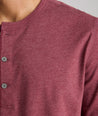 Model is wearing UNTUCKit Ultrasoft Long-Sleeve Henley in deep red.