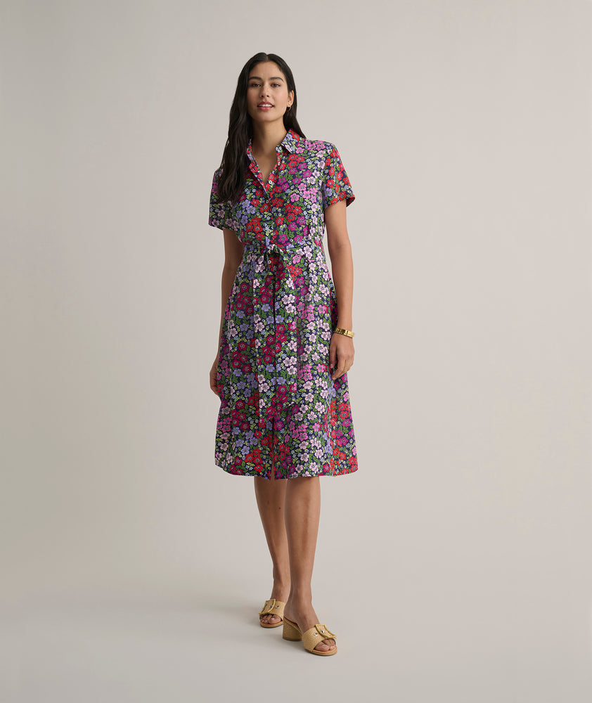 Model is wearing UNTUCKit Annette floral dress. 