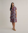 Model is wearing UNTUCKit Annette floral dress. 