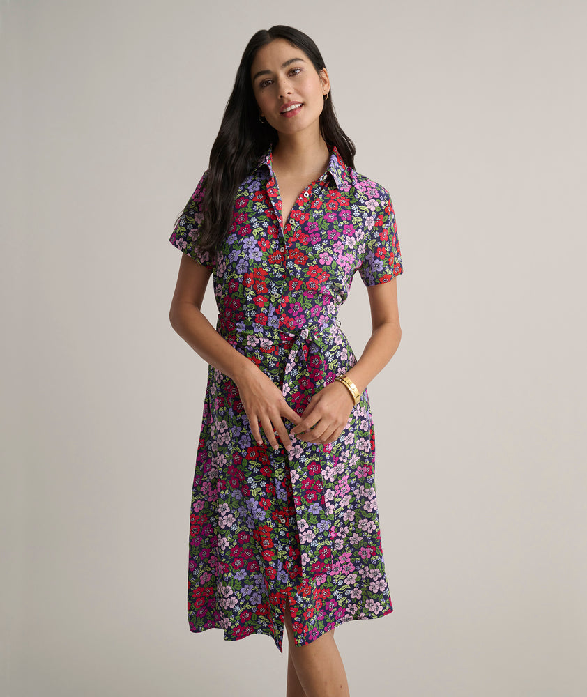 Model is wearing UNTUCKit Annette floral dress. 