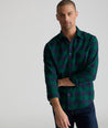 Model is wearing UNTUCKit Flannel Barrelstone Shirt in Blue & Green Check.