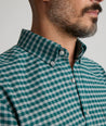 Model is wearing UNTUCKit Wrinkle-Free Performance Flannel Bergstrom Shirt in Green Gingham.