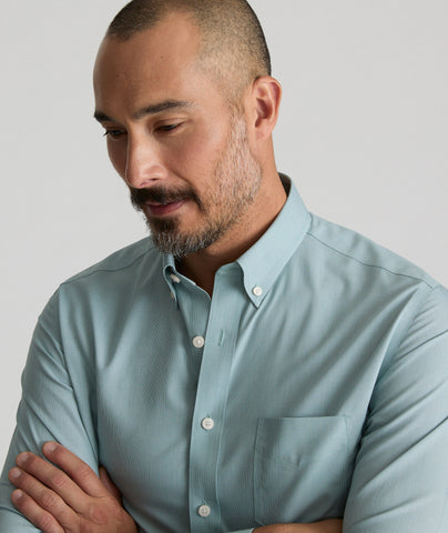 Model is wearing UNTUCKit Wrinkle-Free Cadetto Shirt in Light Green.