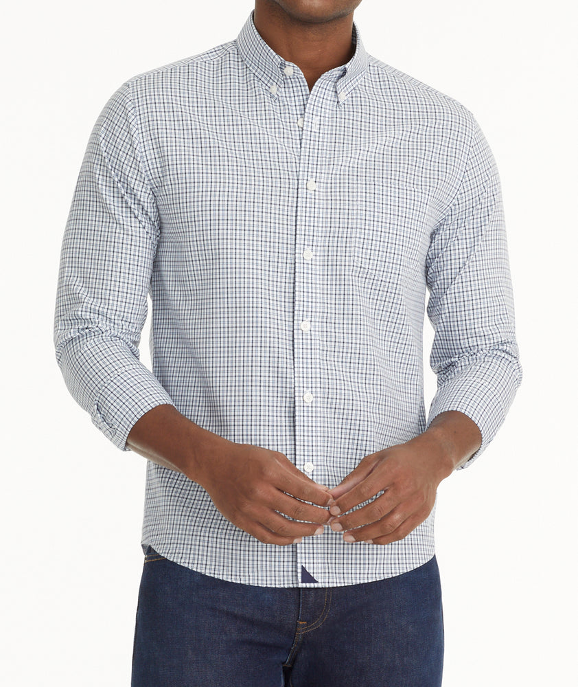 Model is wearing UNTUCKit wrinkle free Caldaro button-down. 