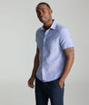 Model wearing an UNTUCKit Blue Wrinkle-Resistant Linen Short Sleeve Cameron Shirt.