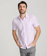 Model wearing an UNTUCKit lavender Wrinkle-Resistant Linen Short-Sleeve Cameron Shirt.