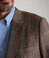 Model is wearing UNTUCKit Italian Wool Carrington Sport Coat.