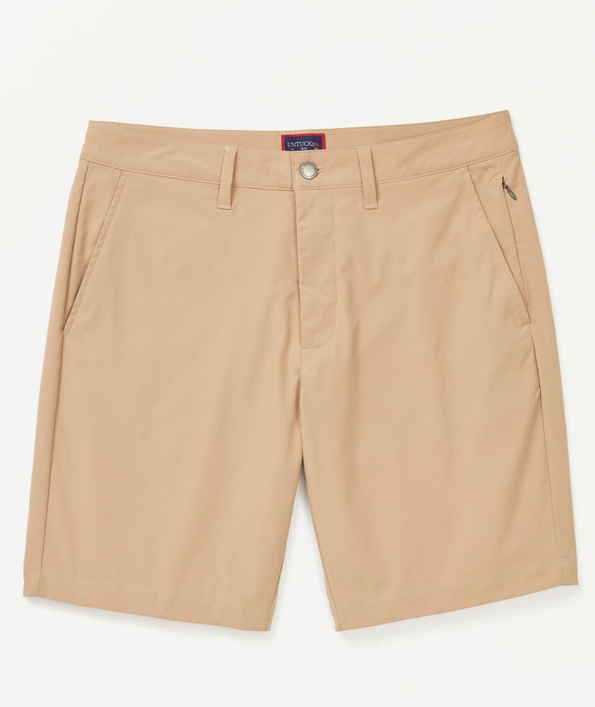 Model wearing UNTUCKit Tan Traveler Shorts.