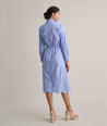 Model is wearing UNTUCKit Claudia dress in blue.