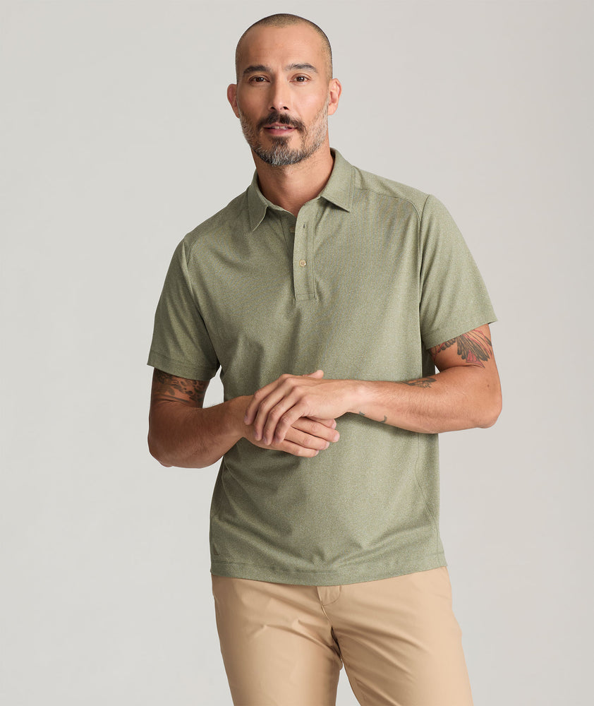 Model is wearing UNTUCKit Clavidor polo in olive.