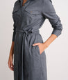 Model is wearing UNTUCKit Colby dress in solid gray.