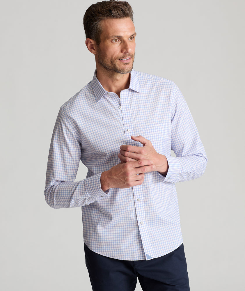 Model is wearing UNTUCKit Cunningham wrinkle-free shirt. 