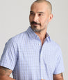 Model is wearing UNTUCKit Dante Short sleeve wrinkle-free shirt.