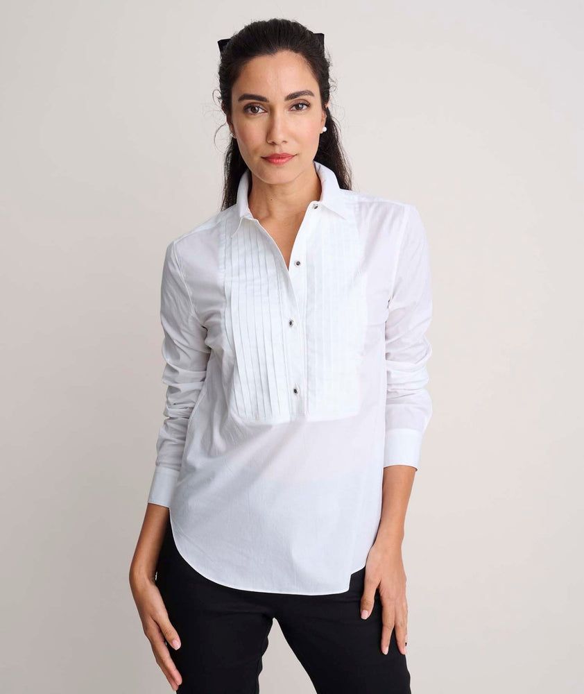 Model is wearing UNTUCKit Dominique shirt in white. 