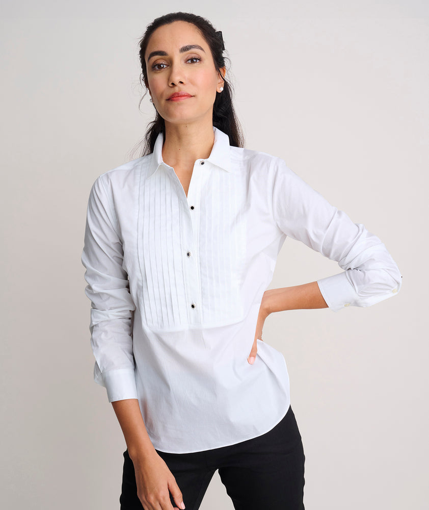 Model is wearing UNTUCKit Dominique shirt in white. 