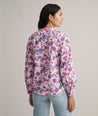 Model is wearing UNTUCKit Cotton Stretch Paisley Print Elaine Shirt.  