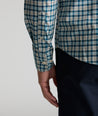 Model is wearing UNTUCKit Wrinkle-Free Elrond Shirt in White & Navy Check.