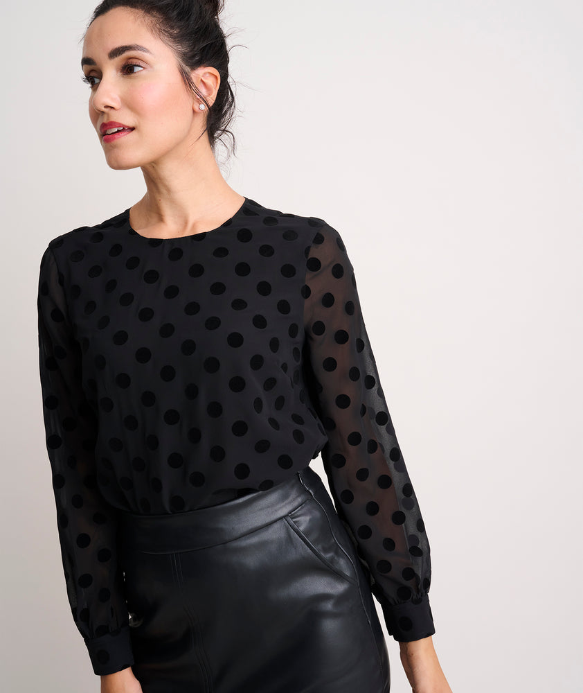 Model is wearing UNTUCKit Polka Dot Textured Eva Shirt.