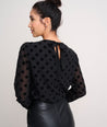 Model is wearing UNTUCKit Polka Dot Textured Eva Shirt.