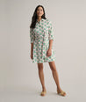 Model is wearing UNTUCKit Cotton Stretch Block Print Evelina Shirtdress.