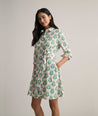 Model is wearing UNTUCKit Cotton Stretch Block Print Evelina Shirtdress.