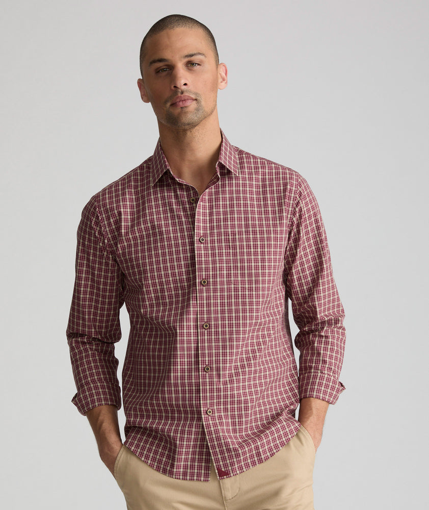 Model is wearing UNTUCKit Wrinkle-Free Gisborne Shirt in Maroon & Gold Check.