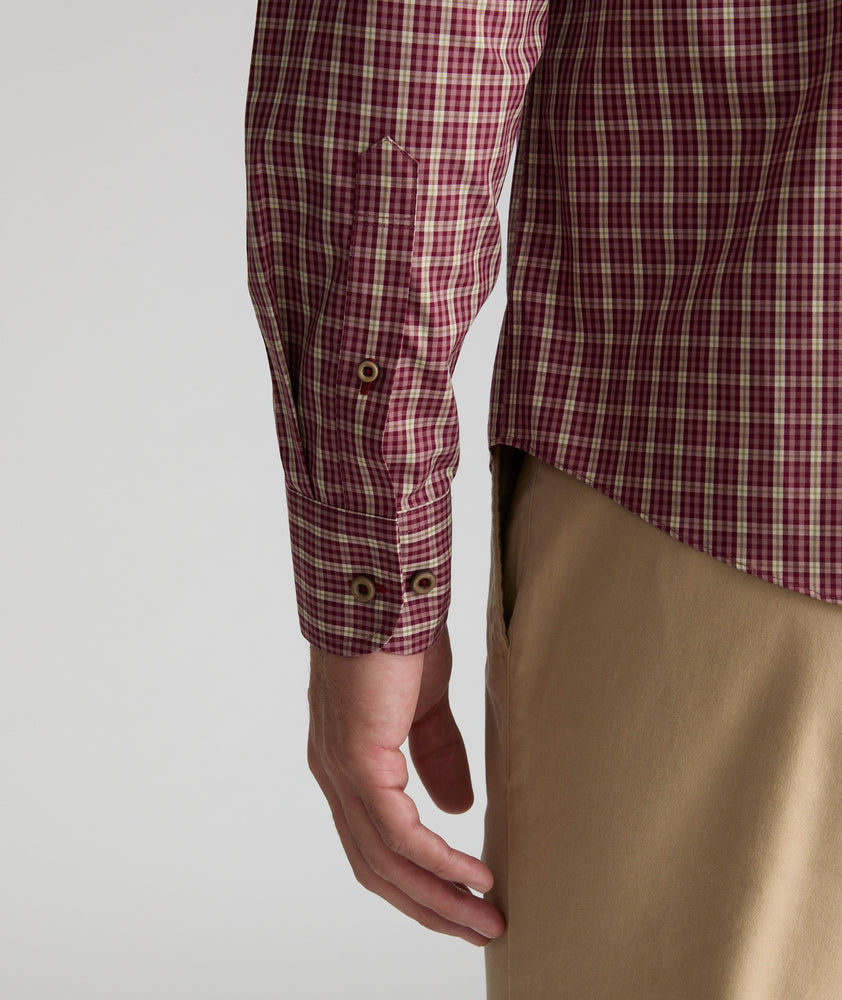 Model is wearing UNTUCKit Wrinkle-Free Gisborne Shirt in Maroon & Gold Check.