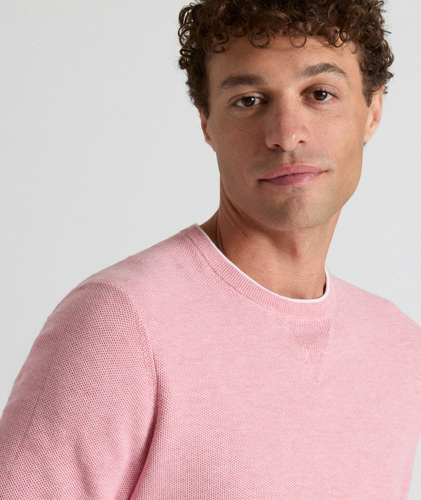 Model is wearing UNTUCKit Greene Crewneck  in Hthr Pink.