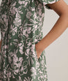 Model is wearing UNTUCKit Cotton Stretch Floral Print A-line Izzie Shirtdress.