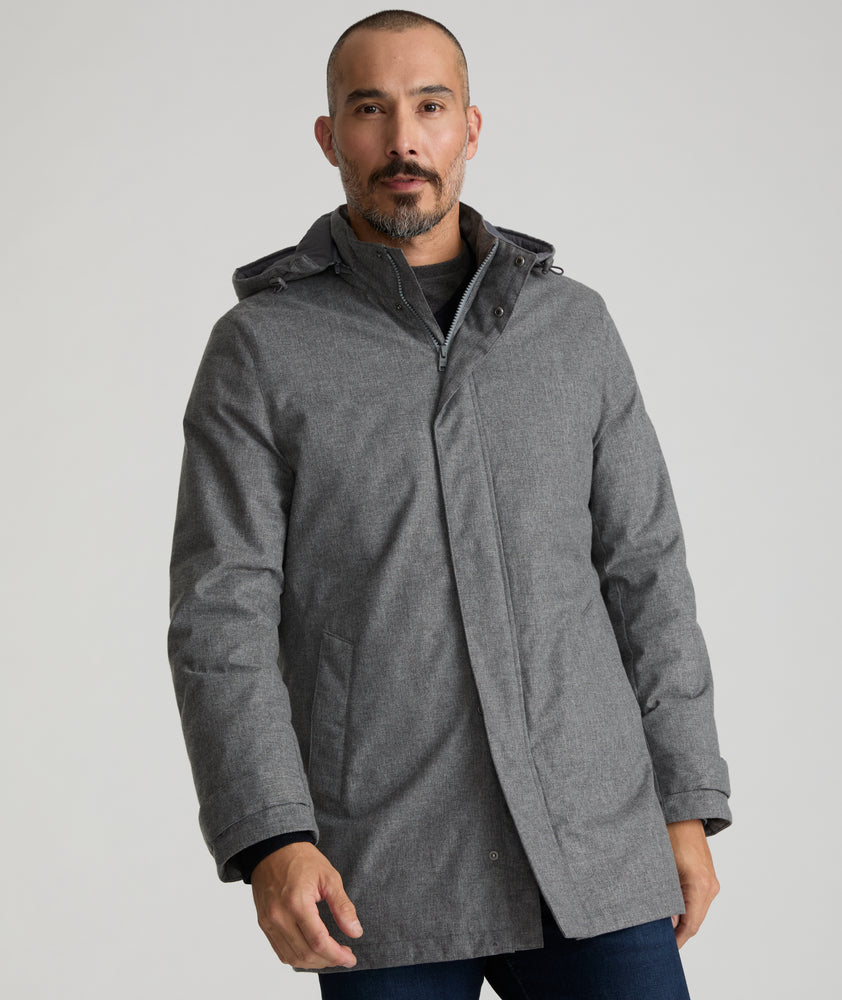 Model is wearing UNTUCKit Jimenez insulated jacket in gray.