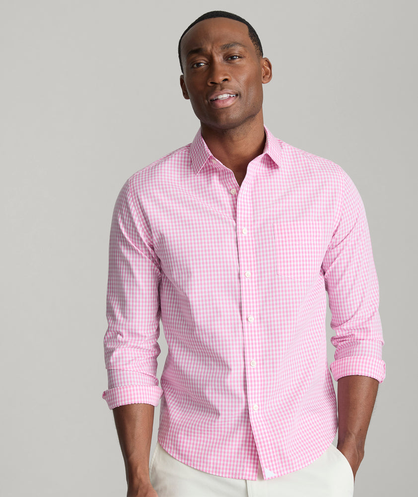 Model is wearing UNTUCKit Lawrence wrinkle free in pink gingham. 