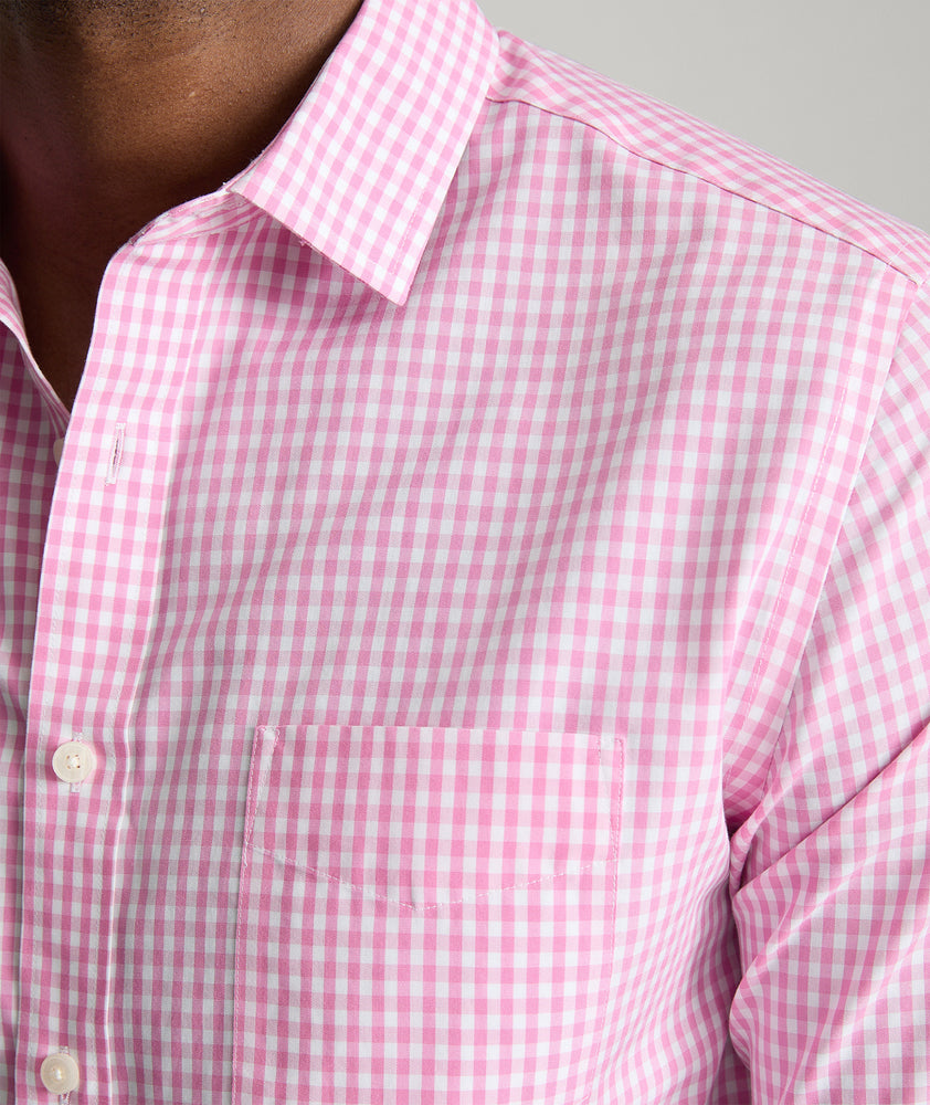 Model is wearing UNTUCKit Lawrence wrinkle free in pink gingham. 