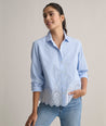 Model is wearing UNTUCKit Cotton Stripe Eyelet Luisa Shirt.