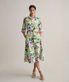 Model is wearing UNTUCKit Long Sleeve Cotton Stretch Floral Print Mariah Shirtdress .