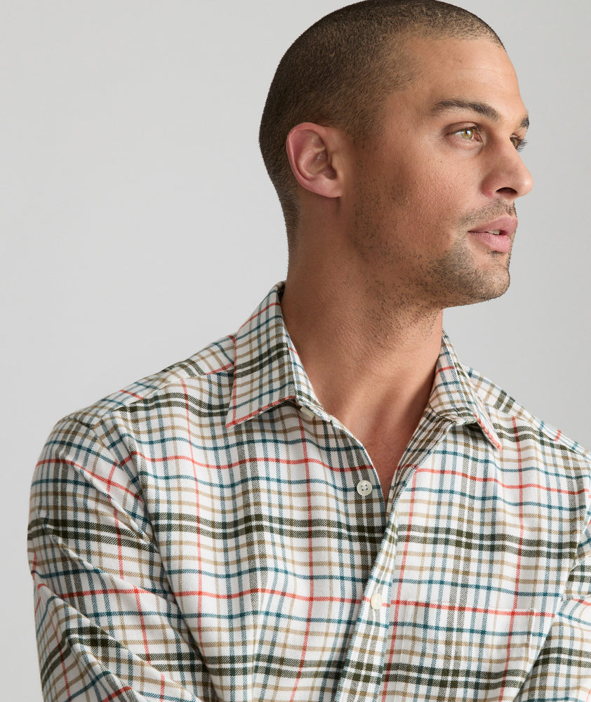 Model is wearing UNTUCKit Flannel Merzling Shirt in White & Green Plaid