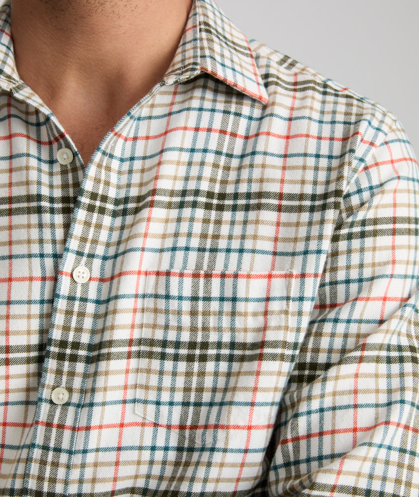 Model is wearing UNTUCKit Flannel Merzling Shirt in White & Green Plaid