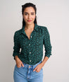 Model is wearing UNTUCKit Natalie top in green.