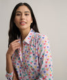 Model is wearing UNTUCKit Natalie shirt.