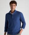 Model is wearing UNTUCKit Newbury cotton quarter zip in heather navy.