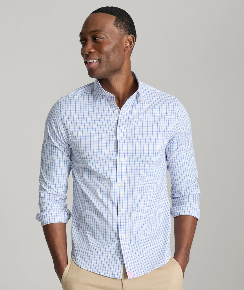 Model is wearing UNTUCKit orsini wrinkle-free performance shirt. 