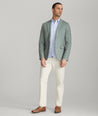 Model is wearing UNTUCKit Palazzo sport coat in green.