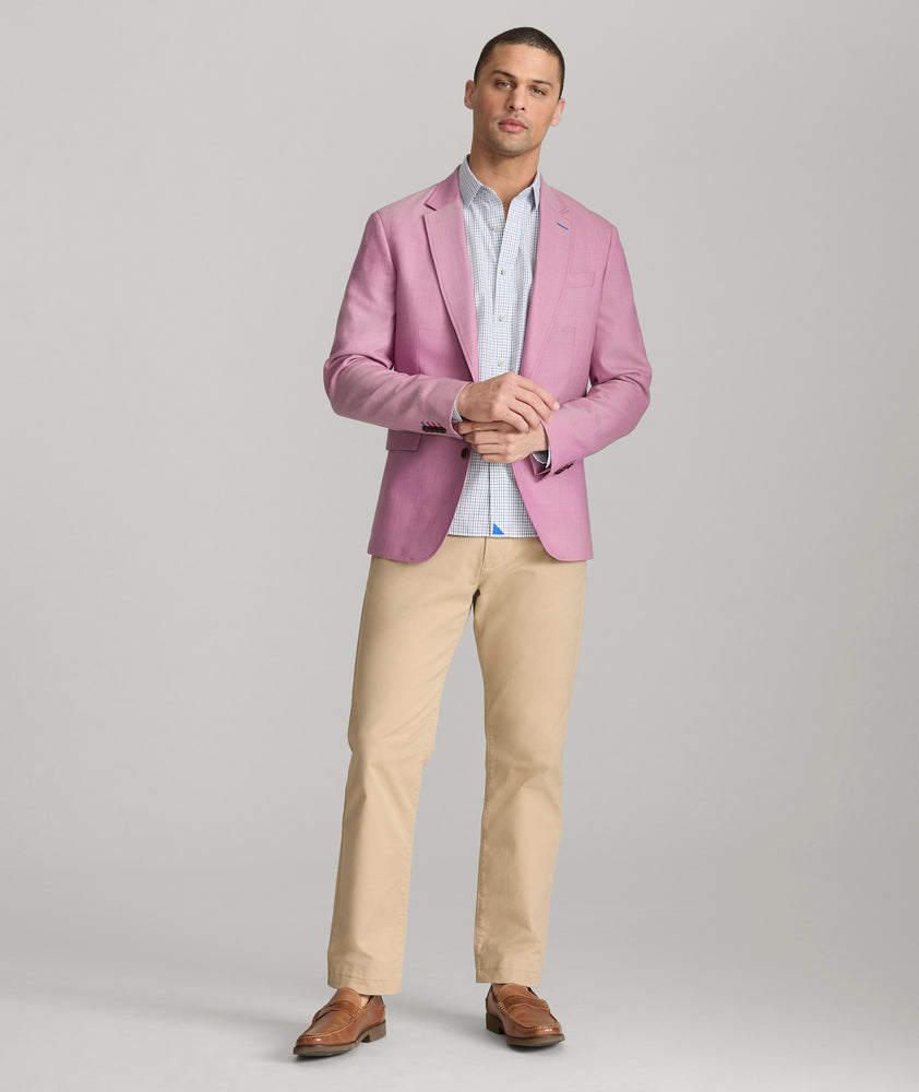 Model is wearing UNTUCKit Palazzo sport coat in pink.